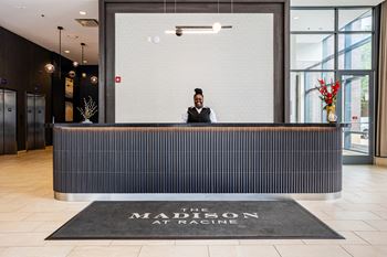 the lobby of the madison at racine hotel